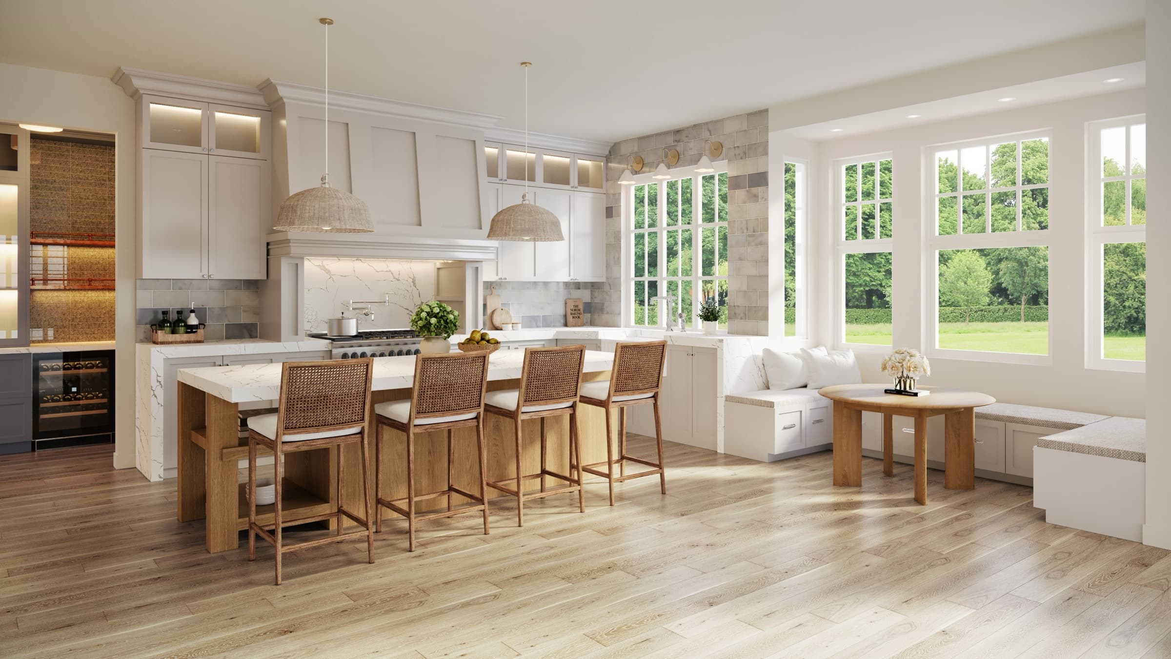 A daylit kitchen with white oak cabinetry, a marble island and a built-in banquette, designed by Jessie K. Homes